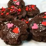 chocolate frosted cookies with sprinkles